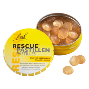 Gelbe Dose mit RESCUE Pastillen, orangefarbene Süßigkeiten mit Blütenessenzen, alkohol- und zuckerfrei.