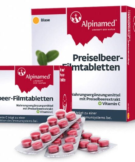 Ein Paket Preiselbeer-Filmtabletten mit rotem Verpackungsdesign, das die Inhaltsstoffe und Anwendung zeigt.