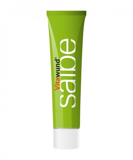 Grüne Tube mit der Aufschrift "Vitawund Salbe", die für die Hautpflege verwendet wird.