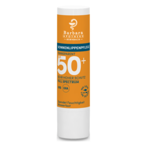 Lippenpflege mit Sonnenfilter, SPF 50+, wasserfest und feuchtigkeitsspendend, in einem weißen Stick mit orangem Etikett.